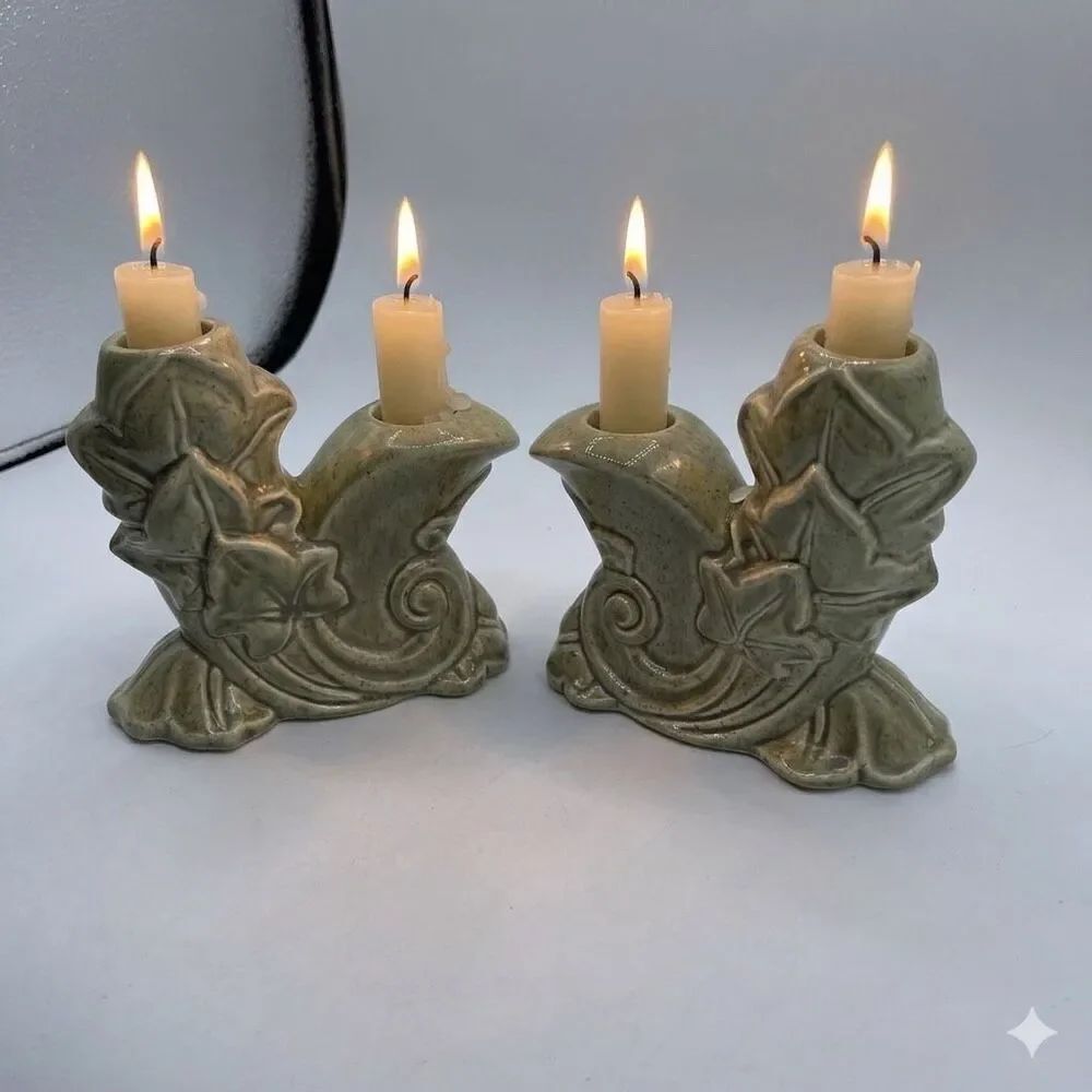 Vintage pair of MidCentury Modern green ceramic candle holders.